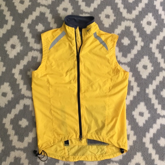 yellow nike vest